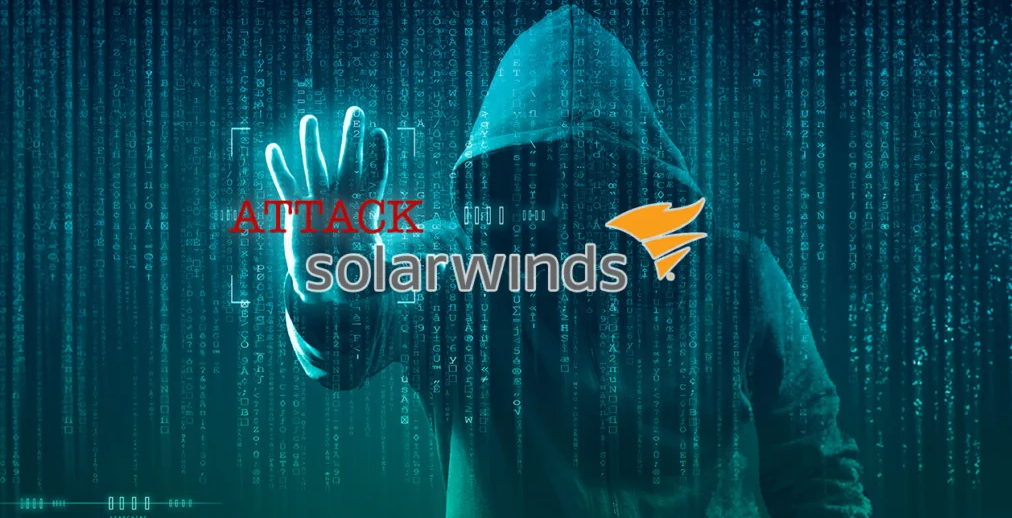 Image of hacker holding up a sign saying Attack Solarwinds